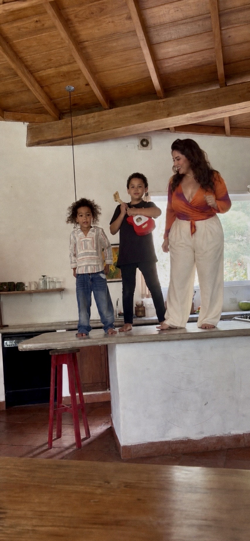 Tori Adekoya with her kids at Lake Atitlán
